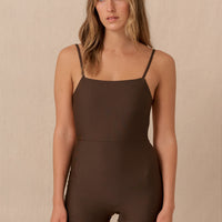 Hakea brown Terrain One Piece shorty surf suit — sustainable swimwear designed for support and comfort in the surf, flattering one piece surf suit for active women.